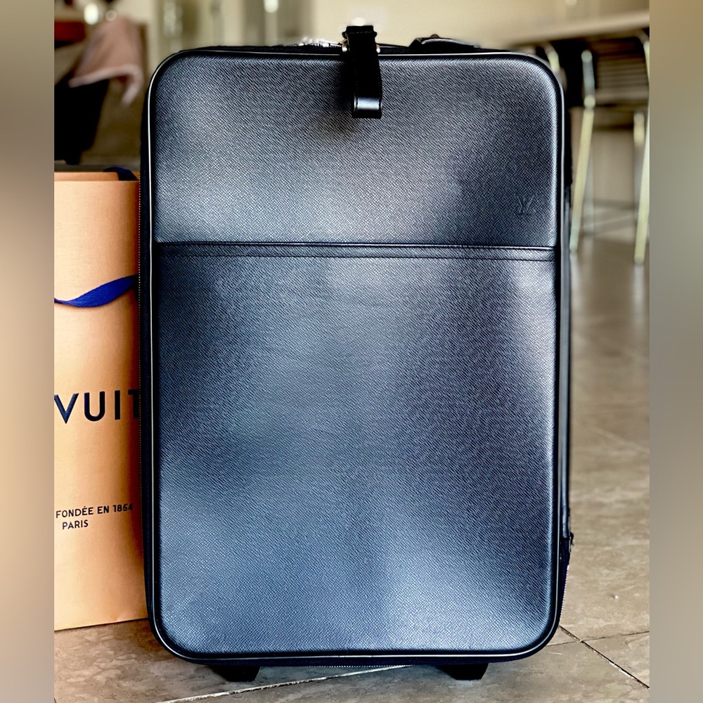 GORGEOUS, NEVER USED Authentic Louis Vuitton
Carry-on Suitcase!